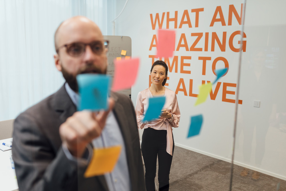 What an amazing time to be alive text on wall